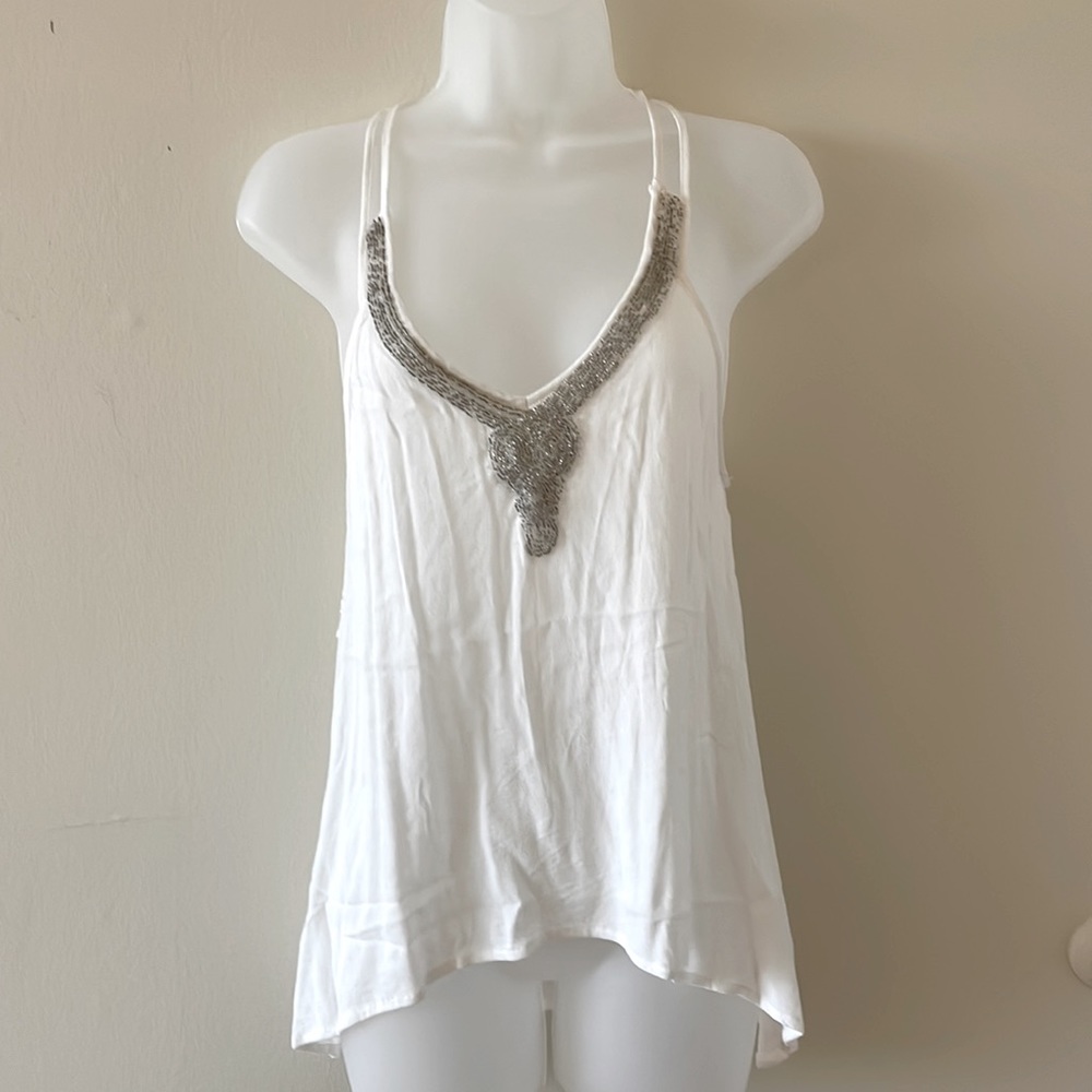 White sleeveless top